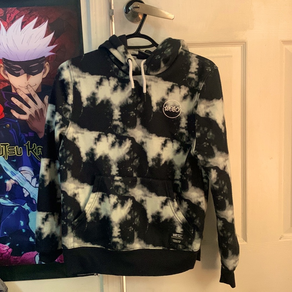 a warm WESC jacket, black and white tie dye, hoodie and pockets, XS Men’s size